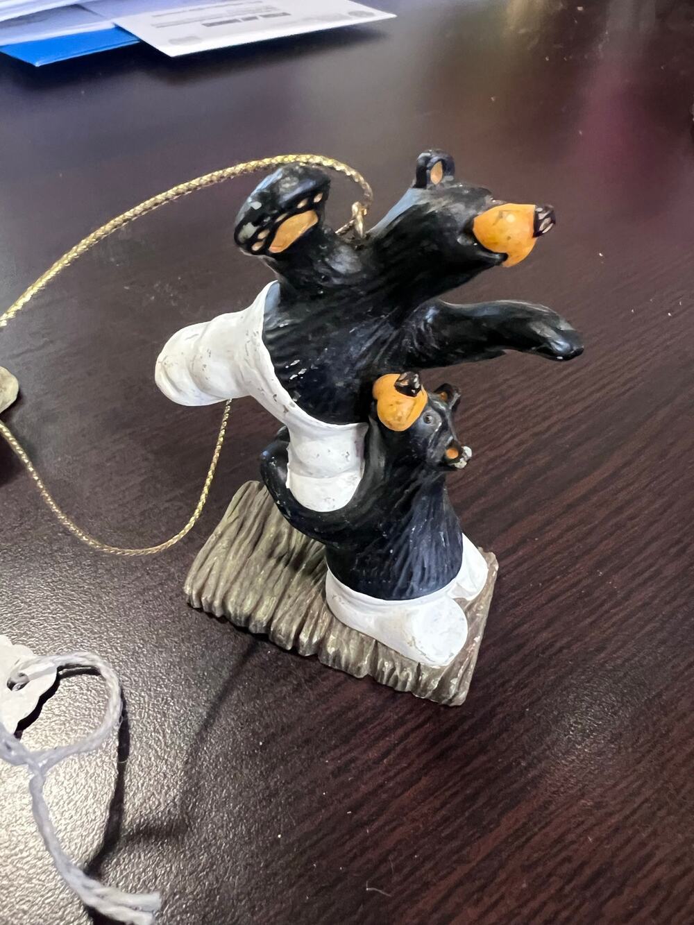 Big Sky Carvers Bearfoots Beartivity ornament designed by artist Jeff Fleming.